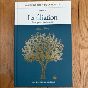 La Filiation Book with Gold Tree Design